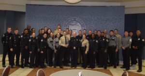 LETA Class 2026-A pose for a group picture.