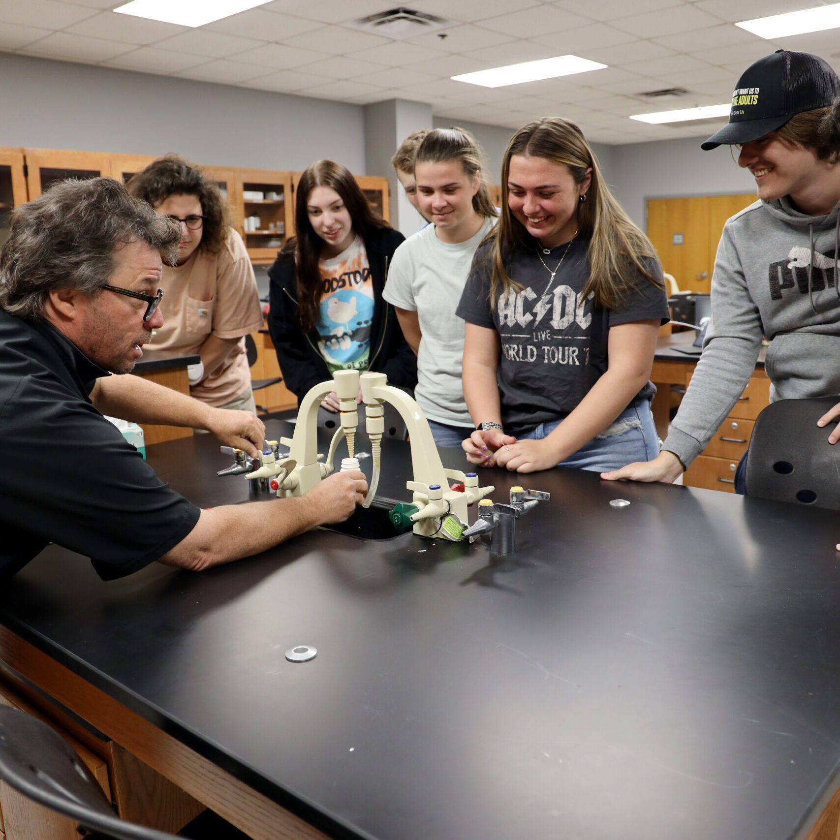 science lab, Kelly Grooms, students, smile